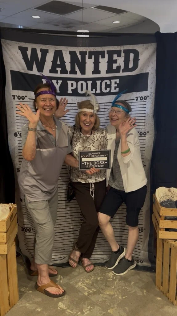 Beacon Hill residents at the 1920s photo booth during Music Through the Decades