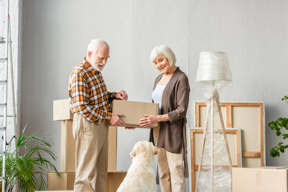 Senior couple packing up and downsizing their home