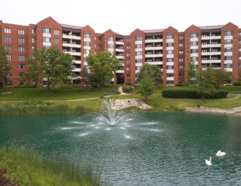 Jad Ryherd Photography, Architectural Photography. lifestyle photography, Commercial photography, Corporate photography, St. Louis Missouri , Jad Pond with fountain in front of residential buildings at Beacon Hill Senior Living Community