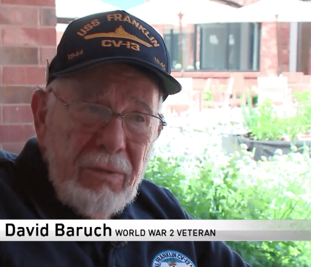 screenshot of news interview with Beacon Hill resident David Baruch telling the story of his WWII service time