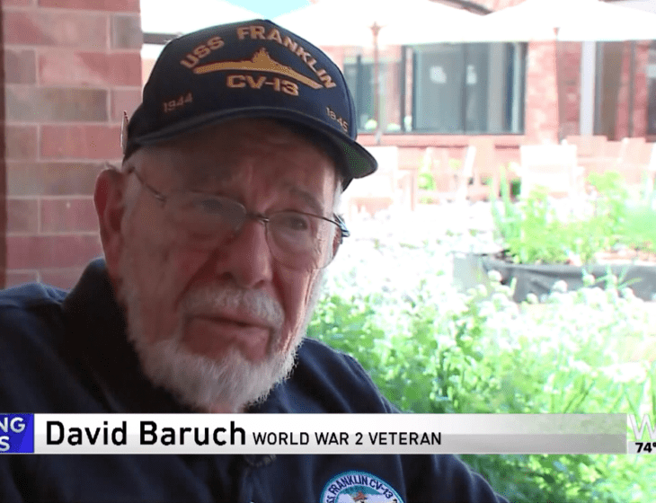 screenshot of news interview with Beacon Hill resident David Baruch telling the story of his WWII service time
