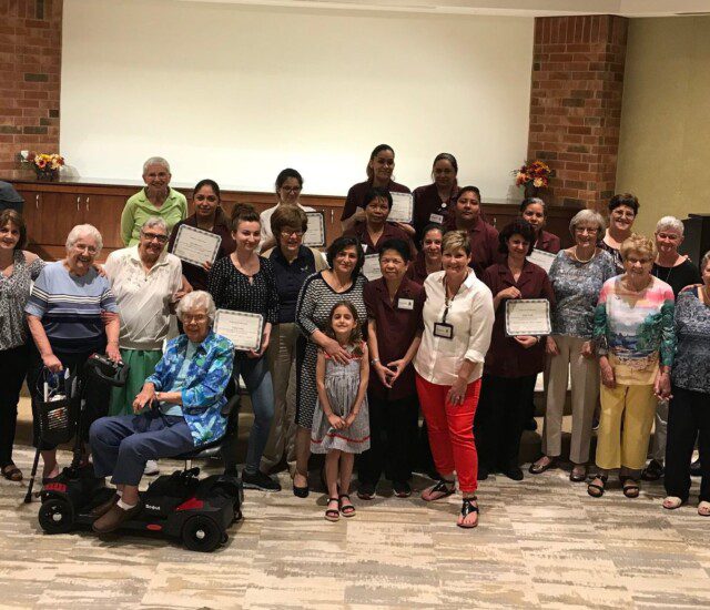 team members and residents at Beacon Hill Senior Living Community