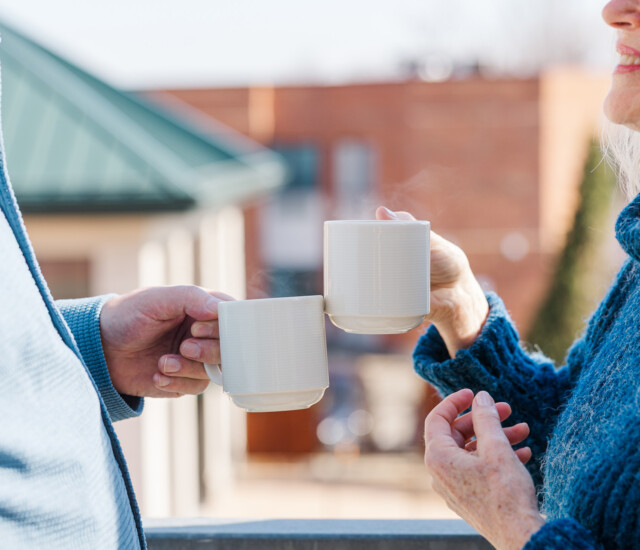 Two Beacon Hill residents sharing coffee together