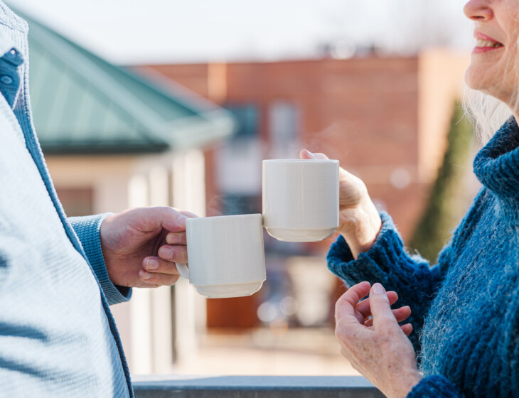 Two Beacon Hill residents sharing coffee together